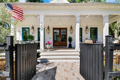 A storybook cottage in the heart of downtown Bluffton, this - photo 3