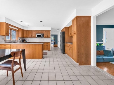 A circular driveway welcomes you to this elegant Colonial set on - photo 15