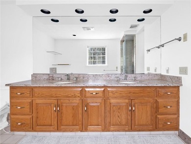A circular driveway welcomes you to this elegant Colonial set on - photo 36