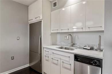 Tucked away at the end of a private hallway with no neighbors - photo 11