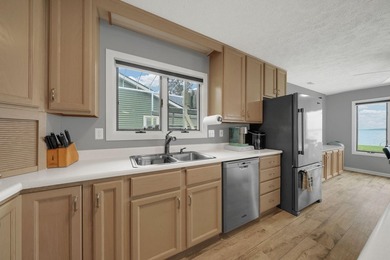 Welcome to lakefront living at its finest on highly sought-after - photo 12