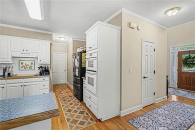Step into this spacious 4-bedroom, 2.5-bath traditional on a - photo 13