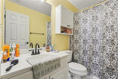 Step into this spacious 4-bedroom, 2.5-bath traditional on a - photo 29