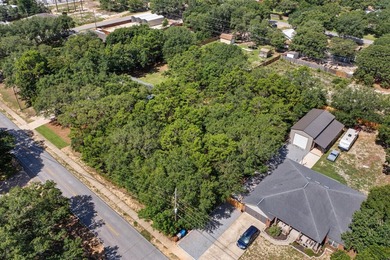 Build your dream home on this oversized vacant lot. Located just - photo 2