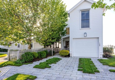 ICONIC OPEN BAYFRONT LOCATION! Welcome to 144 Bay Road, one of - photo 1