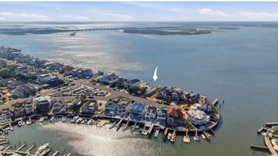 ICONIC OPEN BAYFRONT LOCATION! Welcome to 144 Bay Road, one of - photo 3