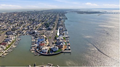 ICONIC OPEN BAYFRONT LOCATION! Welcome to 144 Bay Road, one of - photo 4