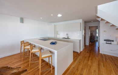 ICONIC OPEN BAYFRONT LOCATION! Welcome to 144 Bay Road, one of - photo 8