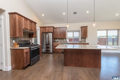 This beautifully maintained 2022 home offers effortless living - photo 15