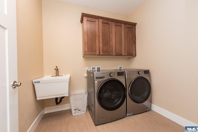 This beautifully maintained 2022 home offers effortless living - photo 32