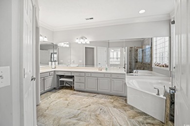 Rare golf-front living just minutes from the beach -- enjoy