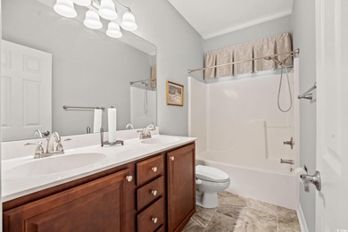 Rare golf-front living just minutes from the beach -- enjoy