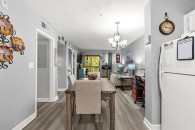 Experience the ultimate island lifestyle in this nicely updated - photo 4