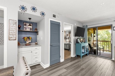 Experience the ultimate island lifestyle in this nicely updated - photo 5