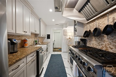 This 6 bedroom 6.5 bathroom property was once a boutique hotel - photo 17