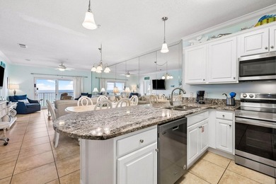Perched on the fifth floor of Emerald Dunes, this beautifully - photo 3
