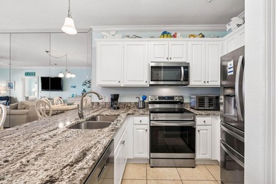 Perched on the fifth floor of Emerald Dunes, this beautifully - photo 5
