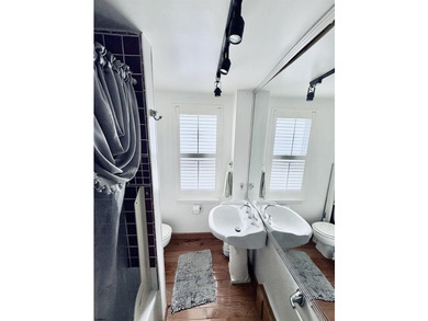 Adorable townhouse boasting an open and inviting floor plan. The - photo 9