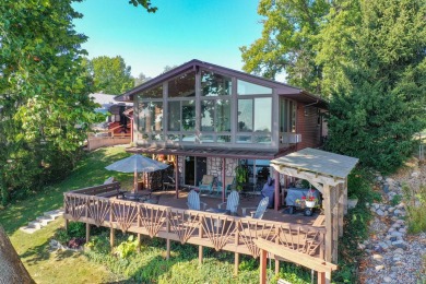 This three-bedroom, two-bath, 2,376-square-foot home overlooks - Lake Home For Sale in Union, Michigan