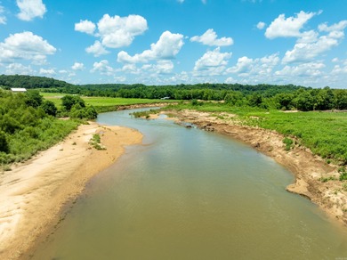 This exceptional 180 +/- acre riverfront ranch in Sharp County