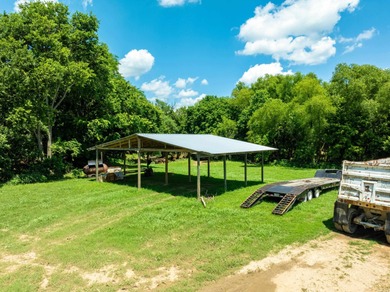 This exceptional 180 +/- acre riverfront ranch in Sharp County