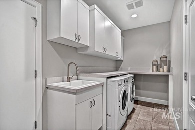 One-of-a-kind foothills home with RV garage. Spectacular view of - photo 39