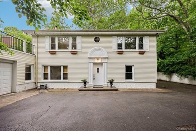 Tucked away behind a gated entrance and nestled among towering - photo 4