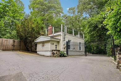 Tucked away behind a gated entrance and nestled among towering - photo 6