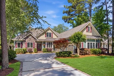 Tucked into a serene waterfront setting where towering trees - photo 1