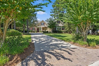 Tucked into a serene waterfront setting where towering trees - photo 3