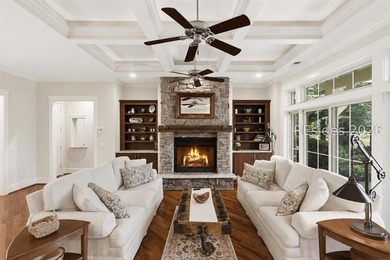 Tucked into a serene waterfront setting where towering trees - photo 6
