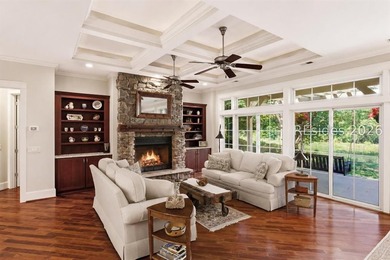 Tucked into a serene waterfront setting where towering trees - photo 7