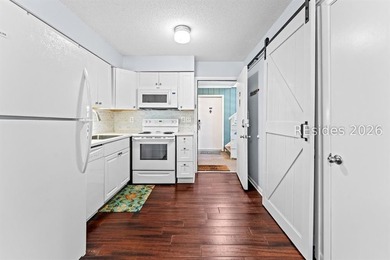 Turnkey, fully furnished second-floor 2-bedroom, 2-bath villa in - photo 2