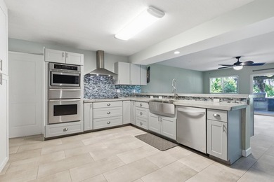 Welcome to this charming 3-bedroom, 2.5-bathroom waterfront - photo 12