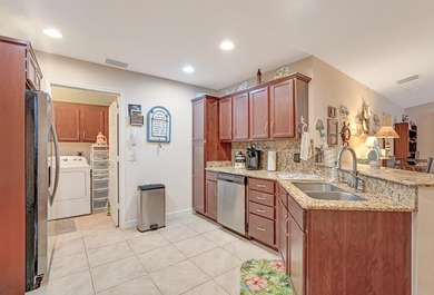 Charming home in Spanish Lakes One, a desirable 55+ community in - photo 19