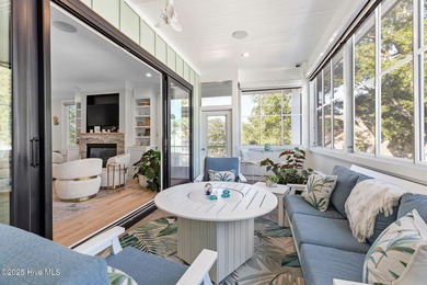 This gorgeous home in Kure Beach Village has 5 bedrooms, 5 1/2