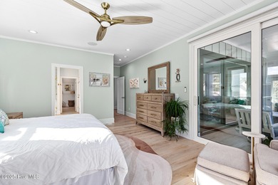 This gorgeous home in Kure Beach Village has 5 bedrooms, 5 1/2