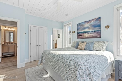 This gorgeous home in Kure Beach Village has 5 bedrooms, 5 1/2