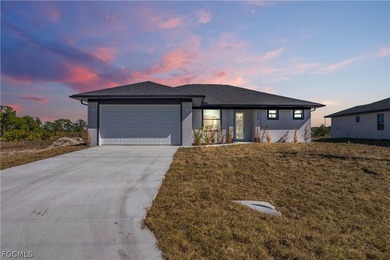 Lake Home For Sale in Lehigh Acres, Florida