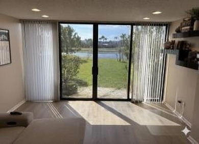 Welcome home to this spacious 2-bedroom, 2-bathroom first-floor - photo 1