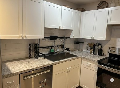 Welcome home to this spacious 2-bedroom, 2-bathroom first-floor - photo 6
