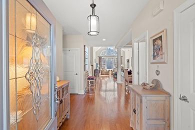 Nestled in a beautiful lakefront setting, this all-brick - photo 4