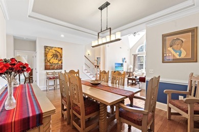 Nestled in a beautiful lakefront setting, this all-brick - photo 9