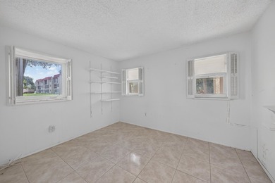 Desirable first-floor end unit in Sunrise Lakes Phase One! This - photo 13