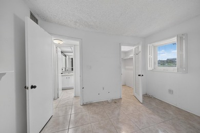 Desirable first-floor end unit in Sunrise Lakes Phase One! This - photo 14