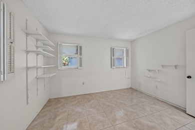 Desirable first-floor end unit in Sunrise Lakes Phase One! This - photo 15