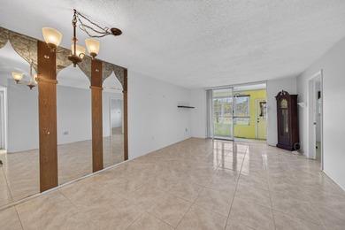 Desirable first-floor end unit in Sunrise Lakes Phase One! This - photo 17