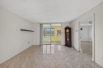 Desirable first-floor end unit in Sunrise Lakes Phase One! This - photo 19