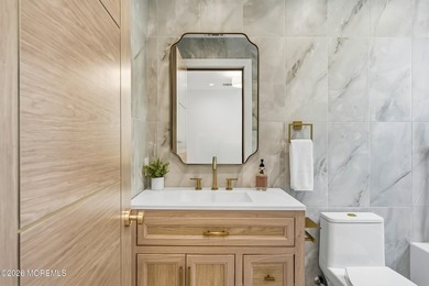 This classic three level, 5th Avenue shore colonial was just - photo 22