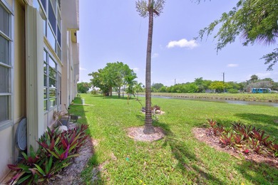 Desirable first-floor end unit in Sunrise Lakes Phase One! This - photo 26